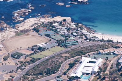 High angle view of townscape by sea