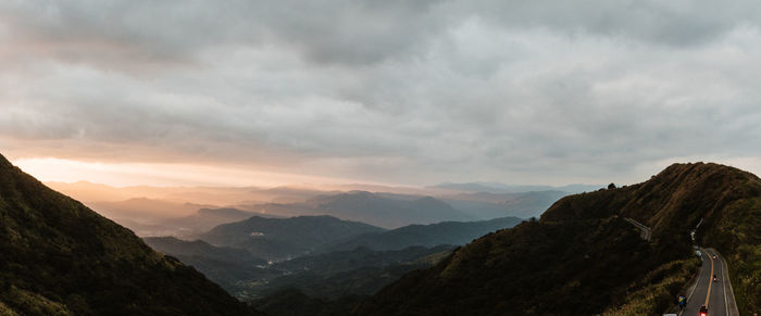 Scenic view of mountains against sky during sunset