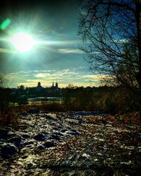 Scenic view of snow against sky during sunset