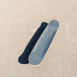 High angle view of skateboard on road