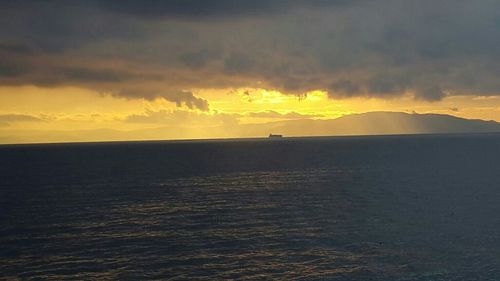 Scenic view of sunset over sea