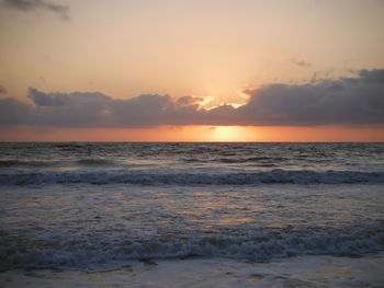 Scenic view of sea at sunset