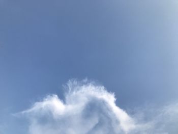 Low angle view of vapor trail in sky