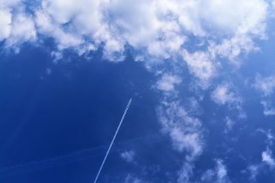 Low angle view of vapor trail in sky