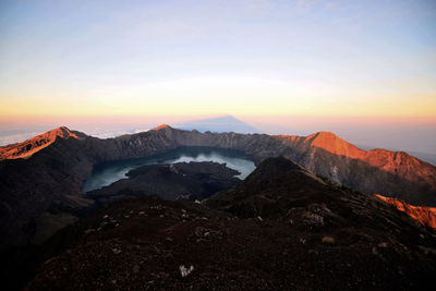 Scenic view of mountains against sky during sunset