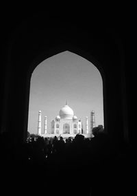 Silhouette of buildings against clear sky