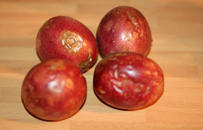 Close-up of red fruits on table