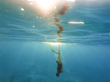 Woman swimming in sea