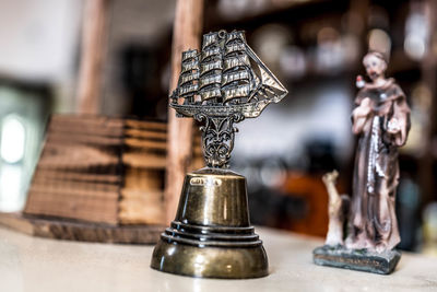 Close-up of trophy on table