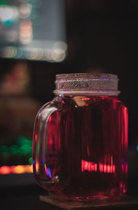 Close-up of glass jar on table