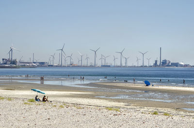 Scenic view of beach against clear sky