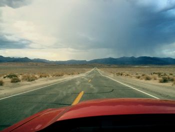 Country road passing through landscape