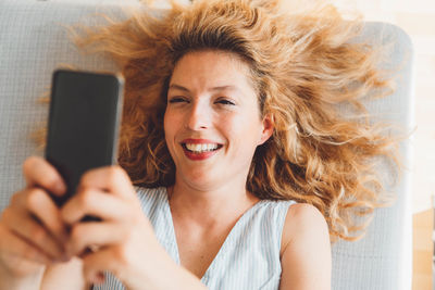 Young woman using mobile phone