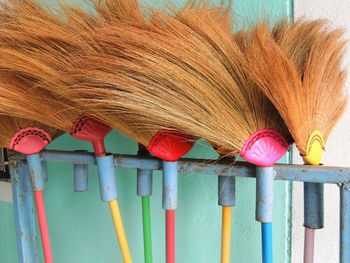 Close-up of multi colored umbrellas on table