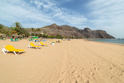 Scenic view of beach against sky