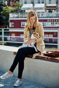 Woman walks with dog