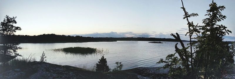 Scenic view of lake at sunset