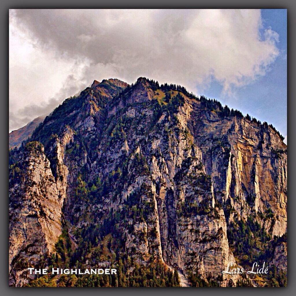 transfer print, rock formation, sky, mountain, auto post production filter, rock - object, cloud - sky, scenics, tranquil scene, tranquility, rocky mountains, geology, beauty in nature, cloud, nature, rock, physical geography, cliff, mountain range, cloudy