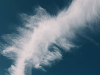 Low angle view of smoke against sky