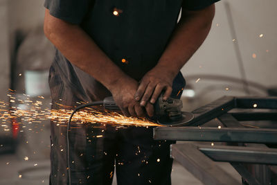 Midsection of man preparing food