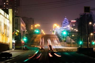 Light trails on city street at night