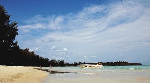 Scenic view of sea against cloudy sky