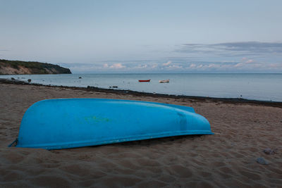 Scenic view of sea shore against sky