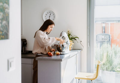 Woman preparing food at home