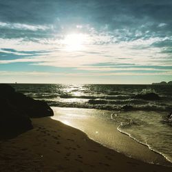 Scenic view of beach against sky