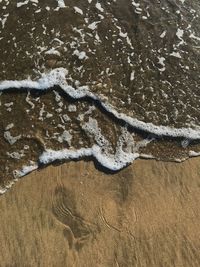 High angle view of sand on beach