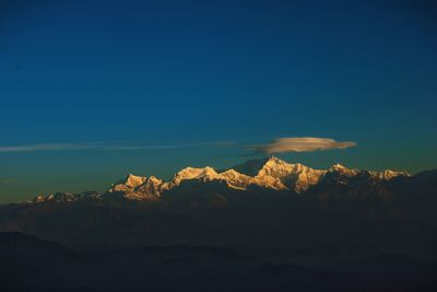 Scenic view of mountains against sky during sunset