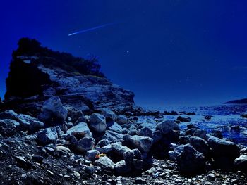 Aerial view of sea against sky at night