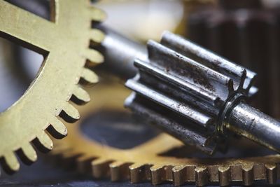 Close-up of machine part on table