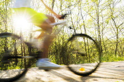 Blurred motion of person playing in park
