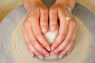 Midsection of man working in bowl