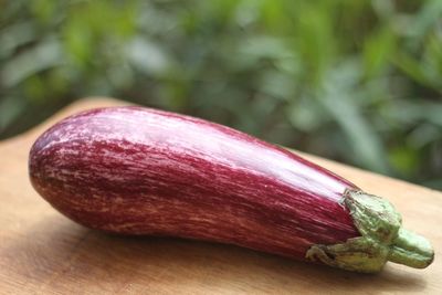 Close-up of purple eggplant on table