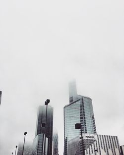 Low angle view of skyscrapers against sky