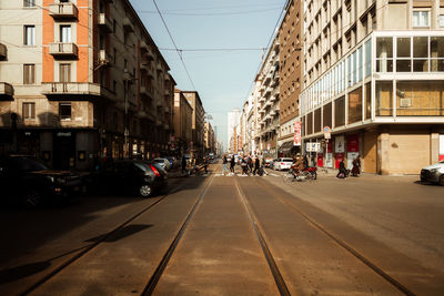 View of city street with tram tracks