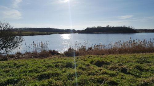 Scenic view of lake against sky