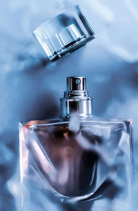 Close-up of perfume bottle