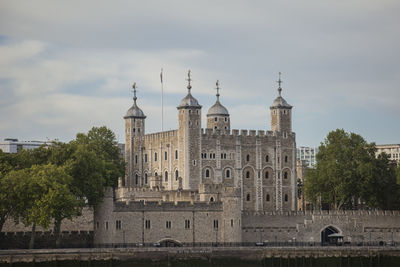 View of building against cloudy sky, tower of london 