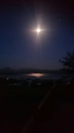 Scenic view of sea against sky at night