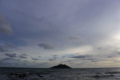 Scenic view of sea against sky at dusk