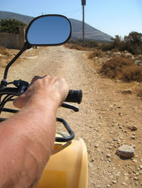 Close-up of man hand holding sunglasses