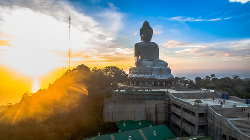 Statue of church at sunset