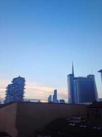 View of cityscape against clear sky