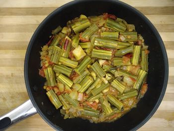 High angle view of chopped vegetables in bowl on table