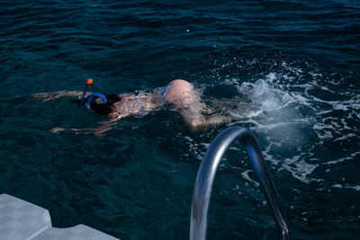 Women swimming in sea