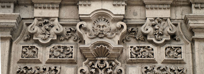 Carving on wall