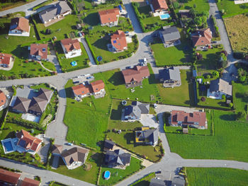 High angle view of houses on field